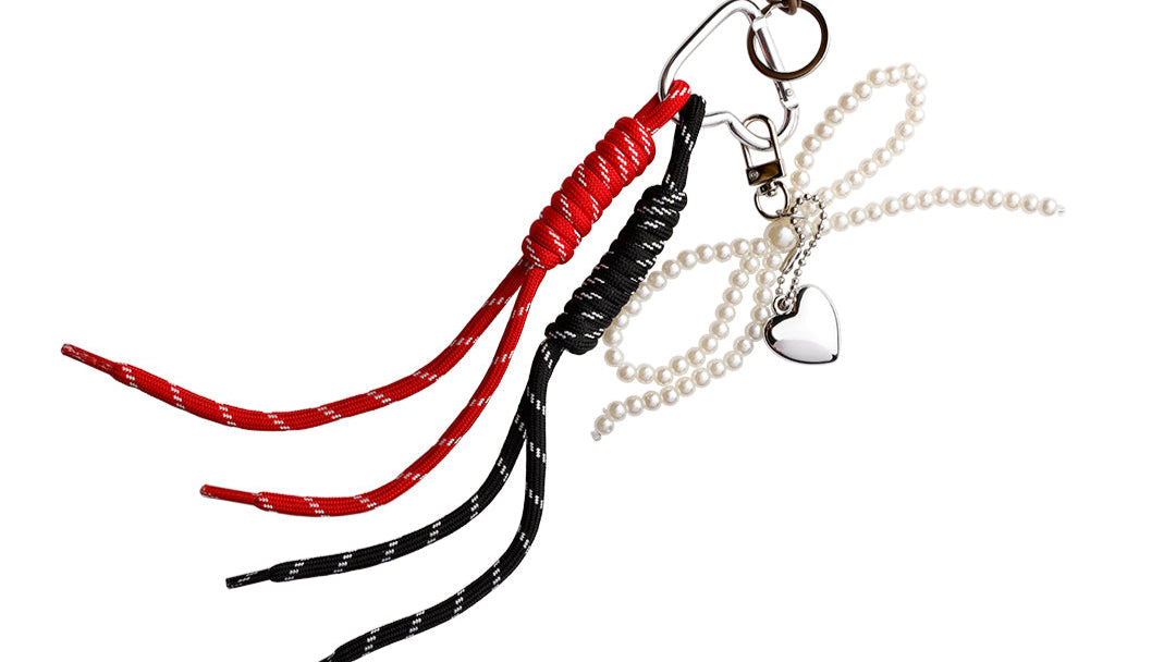 Sløjfe i keyhanger/nøglering/bagcharm